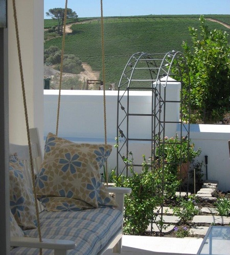 Wrought iron arched pergola