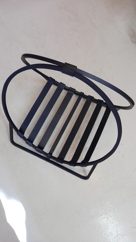 Wrought iron fire log holder